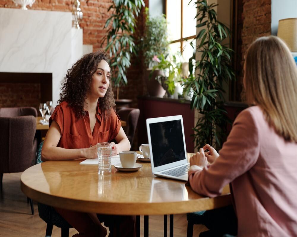 2 women being interviewed for accounting job