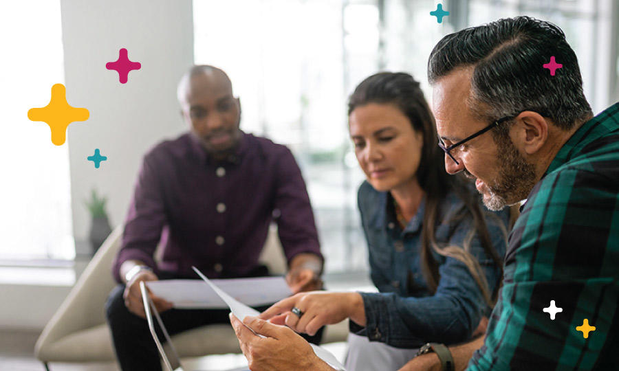 Group of business people reviewing document