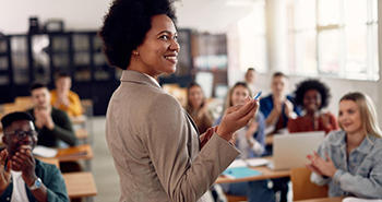 Teacher in front of classroom