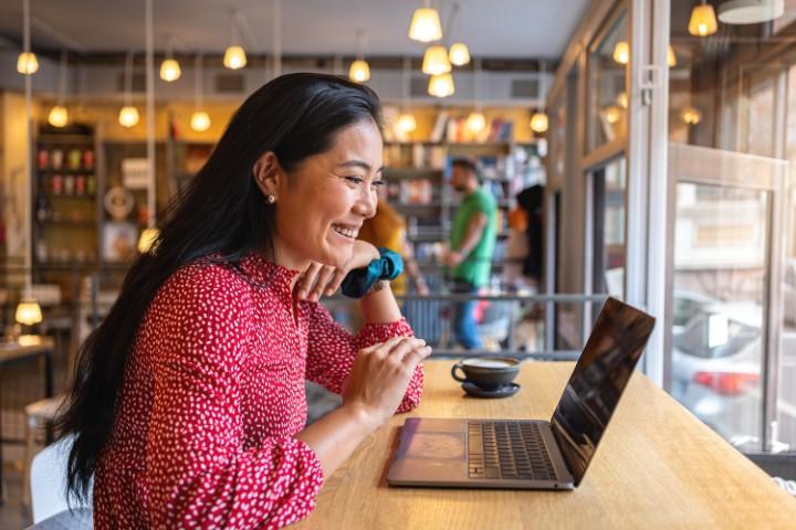 woman looking at a laptop