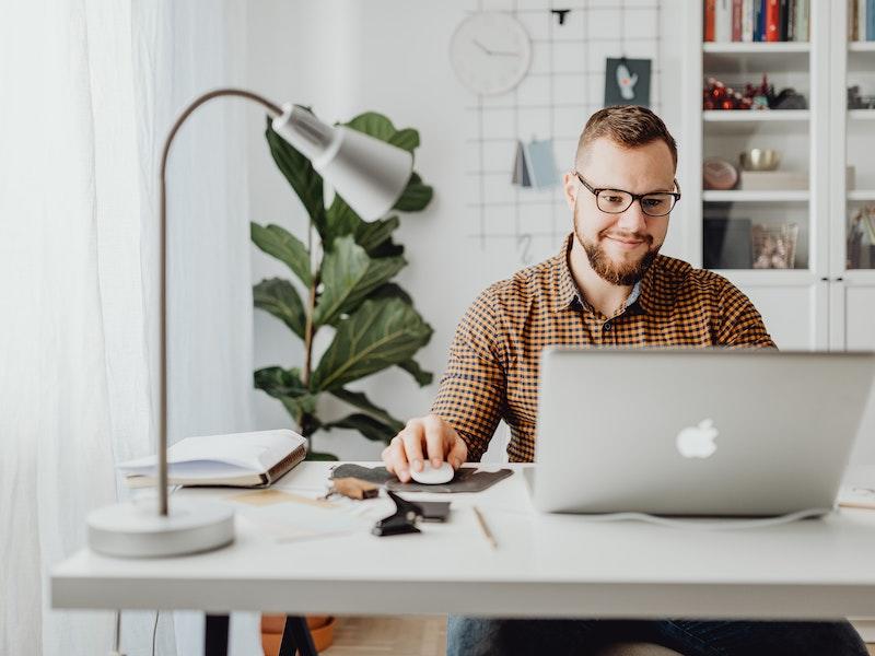 Man choosing a CPA Exam discipline on his laptop 