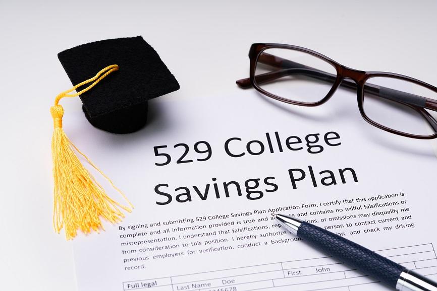 529 Plan tax benefits with image of a graduation cap and glasses